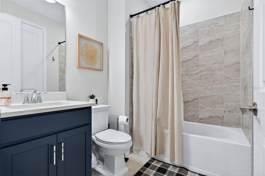 16106 Culpepper Drive Lakewood Ranch, FL 34211 - Photo 86 of 99 a bathroom with a sink a toilet and shower