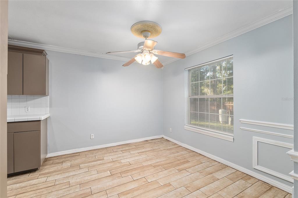 9161 Southwest 34th Place Ocala, FL 34481 - Photo 17 of 100 a window in an empty room with a window
