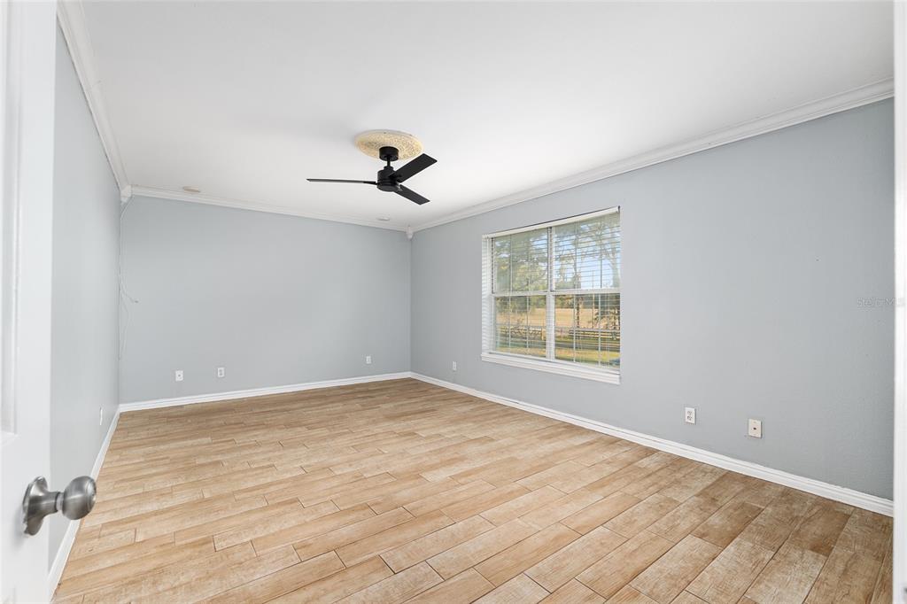 9161 Southwest 34th Place Ocala, FL 34481 - Photo 32 of 100 a view of an empty room with a window