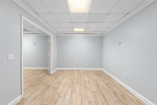 a view of a porch with wooden floor