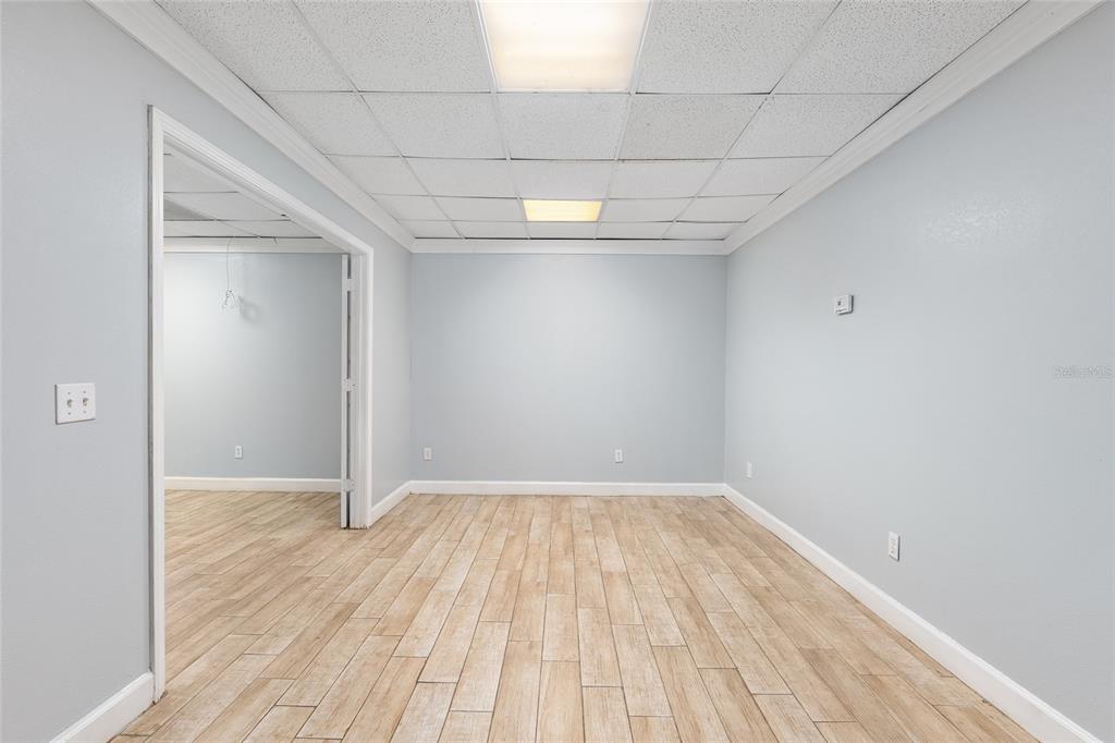 9161 Southwest 34th Place Ocala, FL 34481 - Photo 44 of 100 a view of empty room with wooden floor