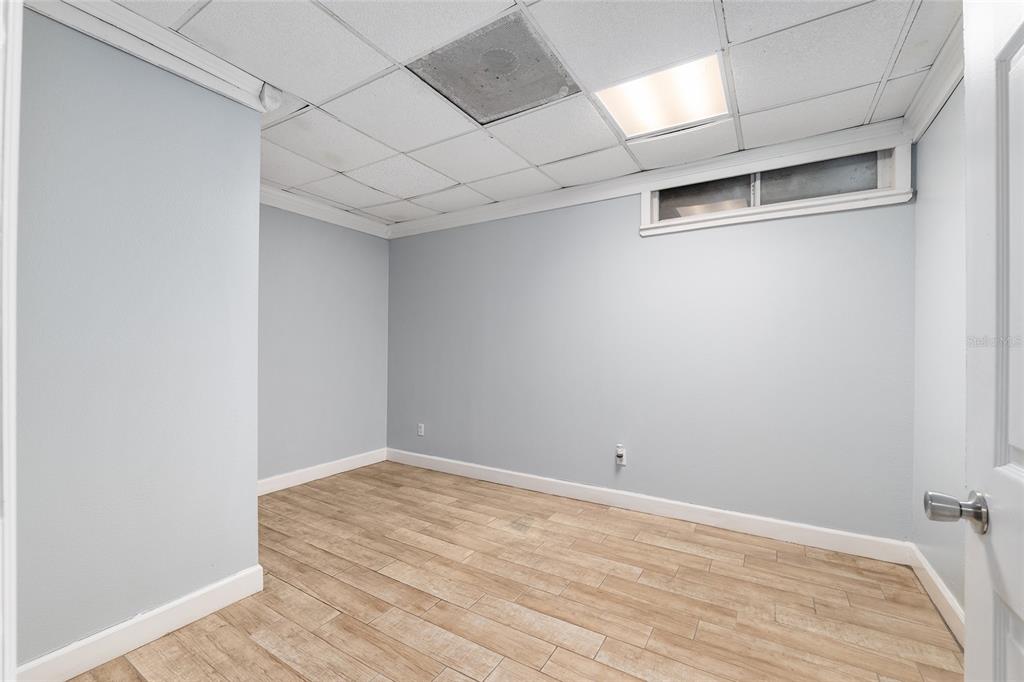 9161 Southwest 34th Place Ocala, FL 34481 - Photo 49 of 100 a view of a room with wooden floor