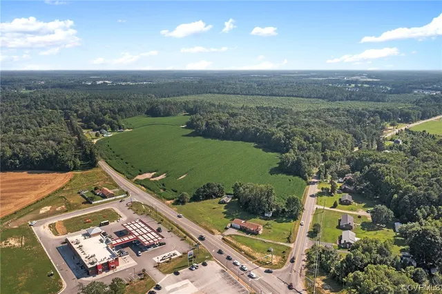 an aerial view of a house with a garden