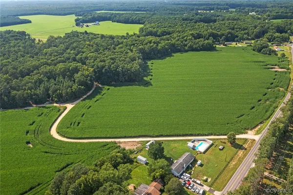 an aerial view of a golf course with a garden