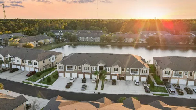 a kitchen with a sink and a refrigerator