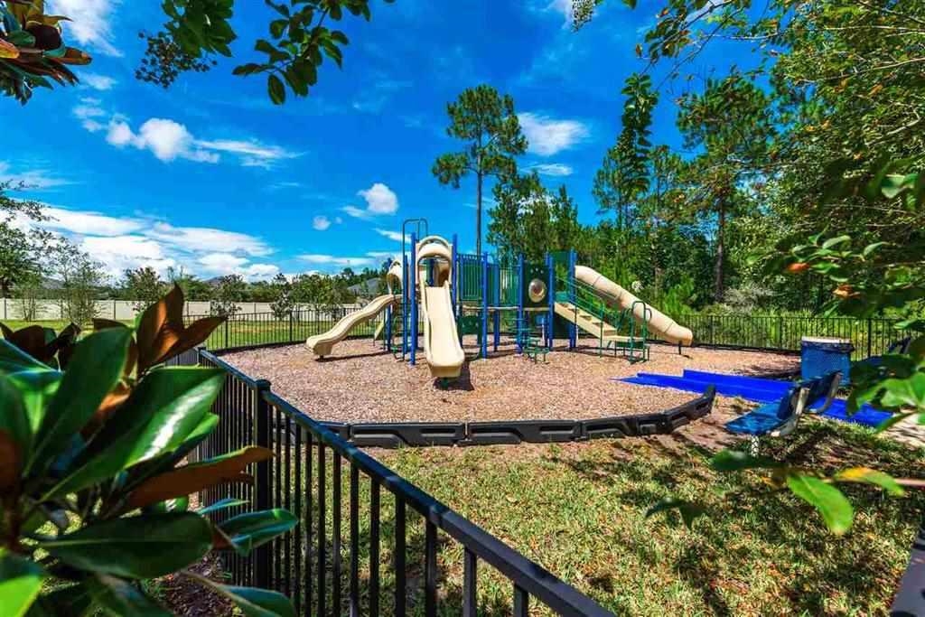 240 Golden Lake Loop St. Augustine, FL 32084 - Photo 19 of 28 a view of a outdoor space with swimming pool