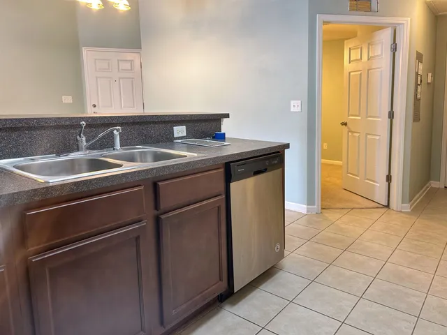 an empty room with closet area