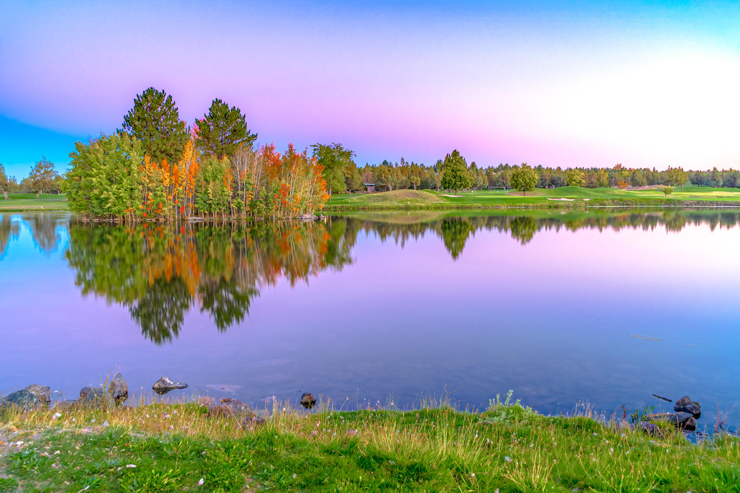 1378 Highland View Loop Redmond, OR 97756 - Photo 65 of 98 a view of a lake with houses in the background