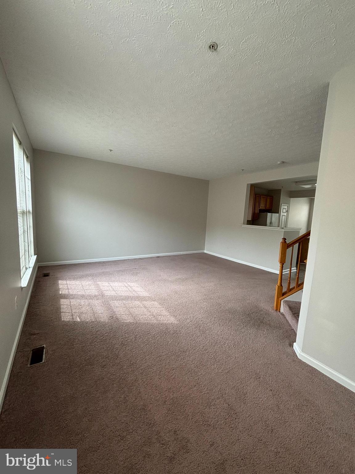 9804 Redwing Drive, Unit 9804 Perry Hall, MD 21128 - Photo 16 of 25 an empty room with windows
