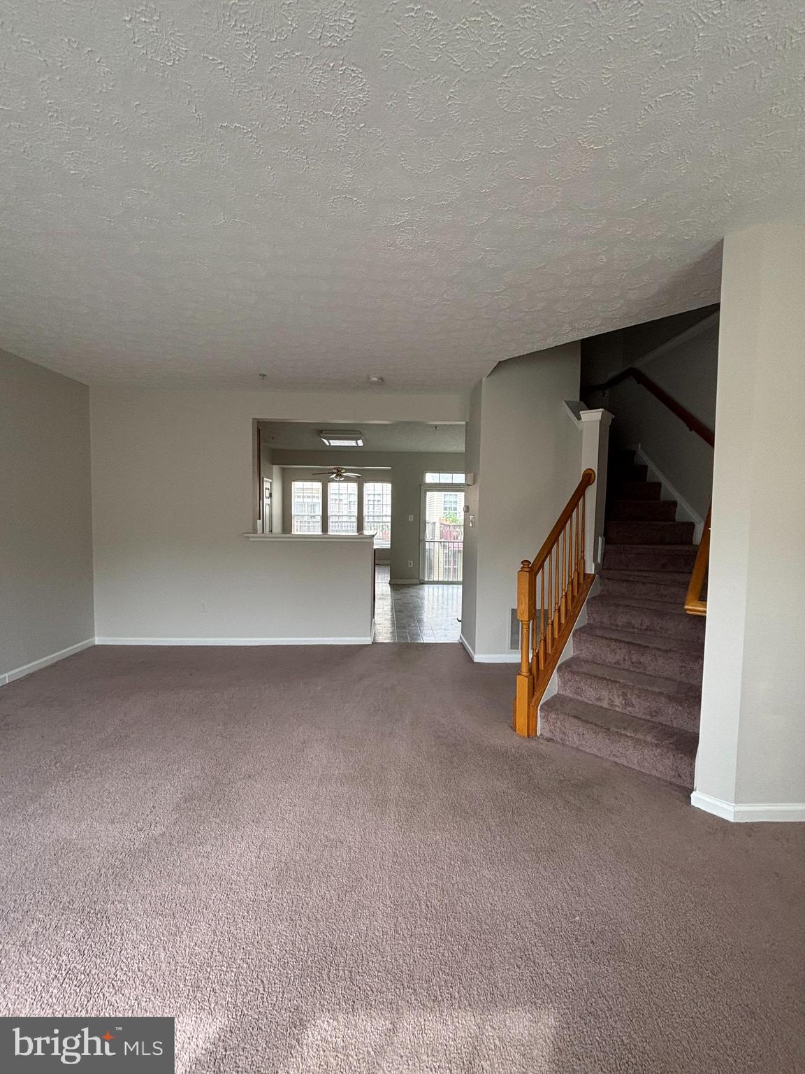 9804 Redwing Drive, Unit 9804 Perry Hall, MD 21128 - Photo 17 of 25 a view of a hallway with staircase