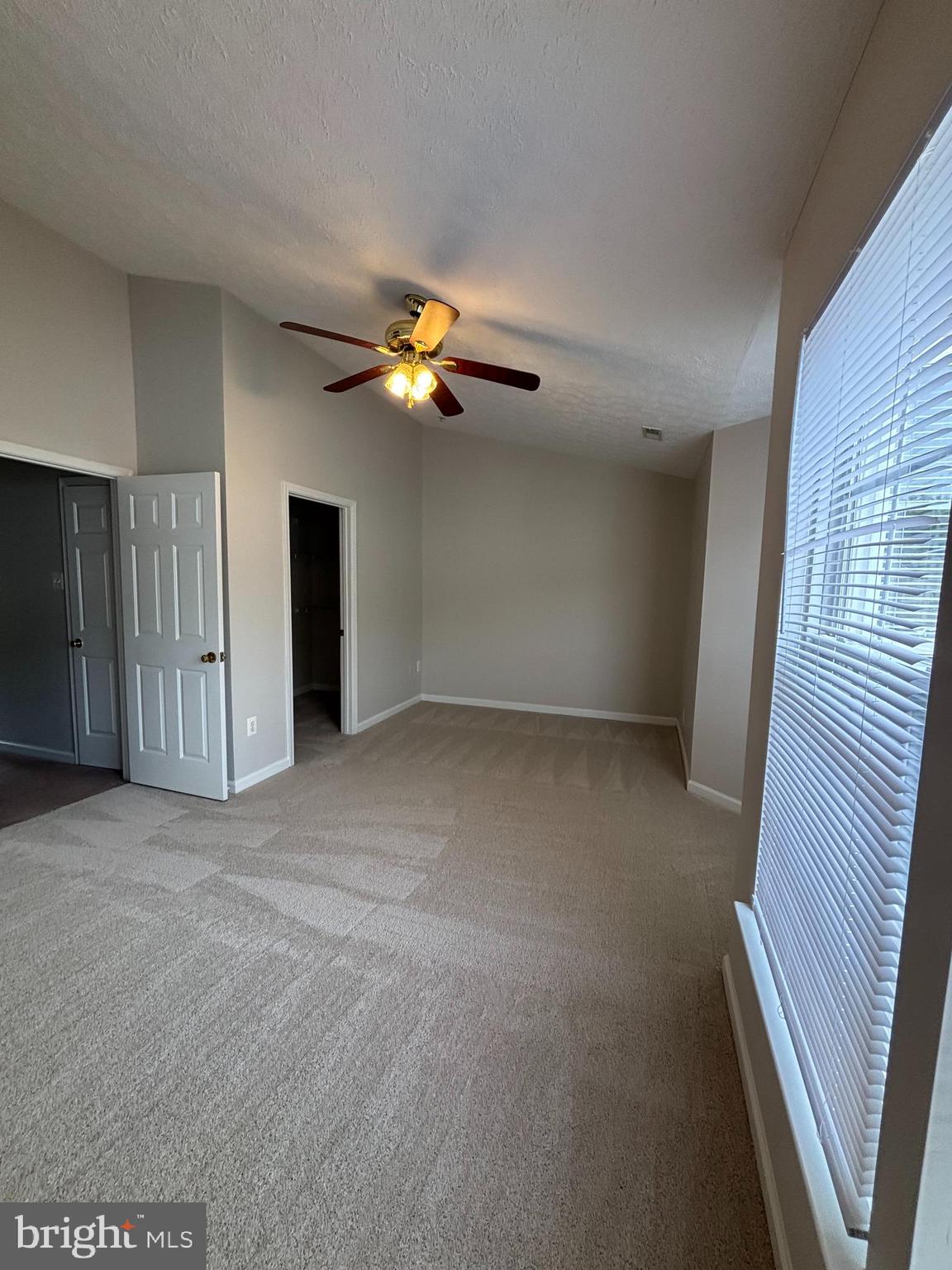 9804 Redwing Drive, Unit 9804 Perry Hall, MD 21128 - Photo 19 of 25 a view of an empty room with a window