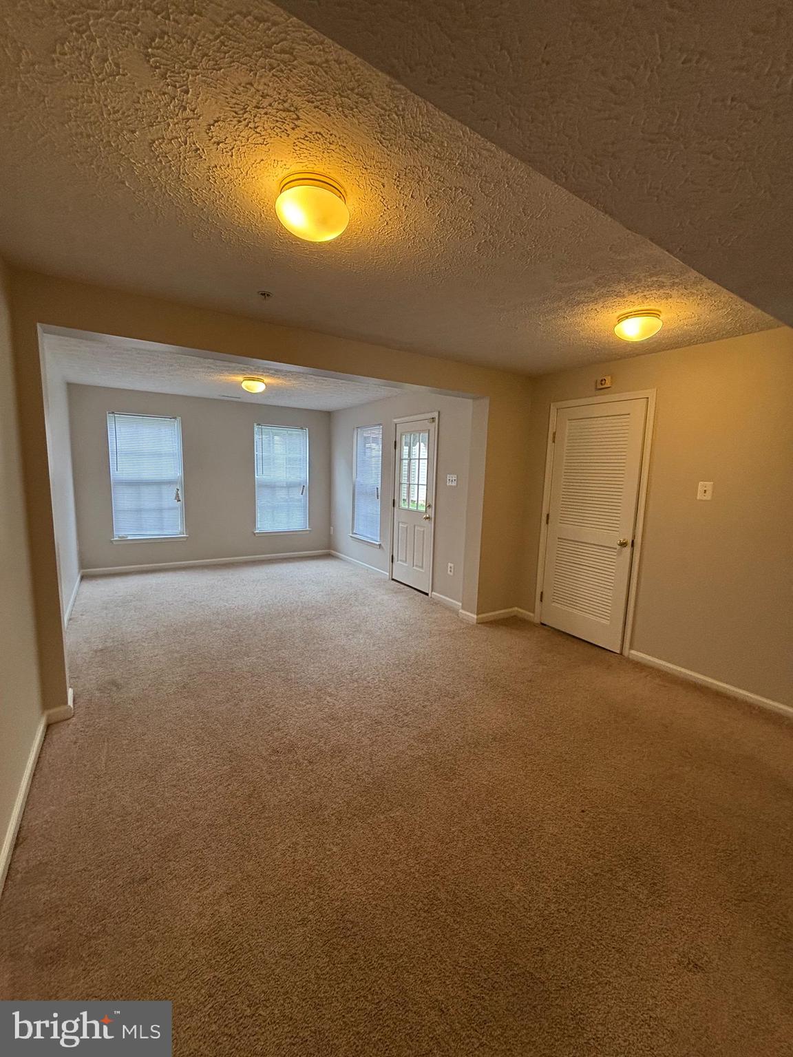 9804 Redwing Drive, Unit 9804 Perry Hall, MD 21128 - Photo 6 of 25 a view of empty room with window
