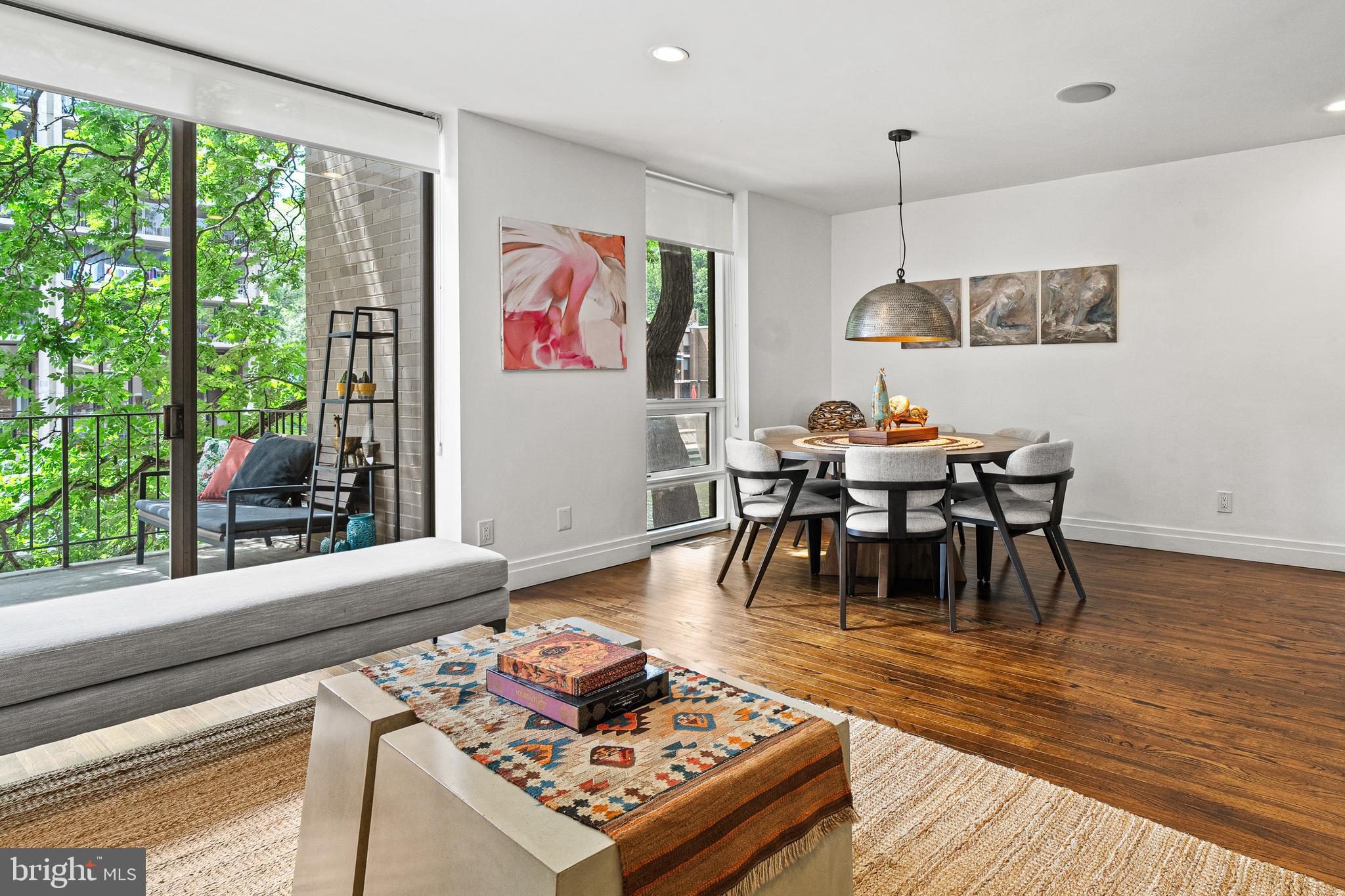 1674 Chimney House Road Reston, VA 20190 - Photo 12 of 39 a living room with furniture and a wooden floor