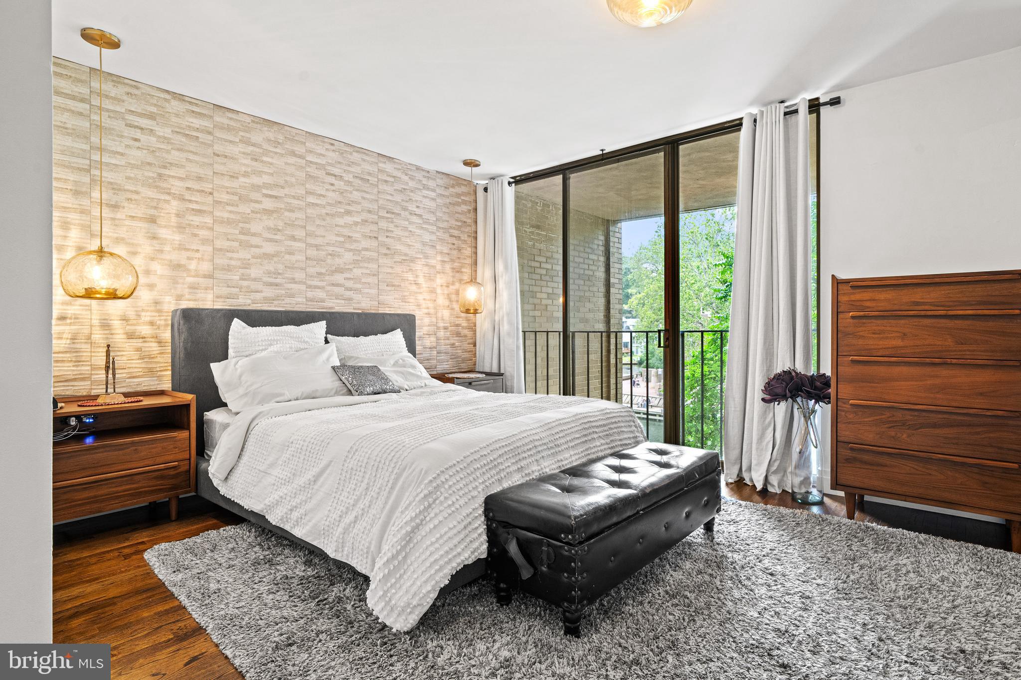 1674 Chimney House Road Reston, VA 20190 - Photo 14 of 39 a bedroom with a bed and large window