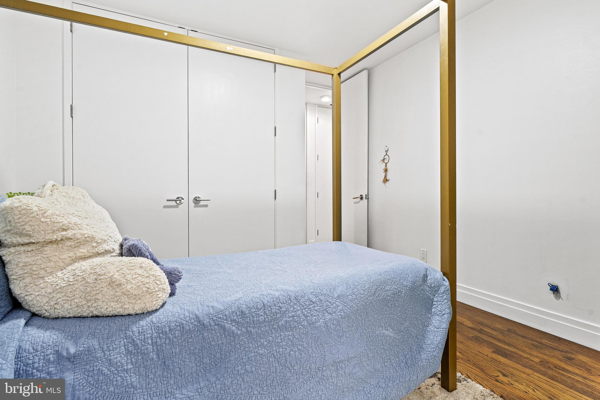 1674 Chimney House Road Reston, VA 20190 - Photo 22 of 39 a bedroom with a bed and a mirror