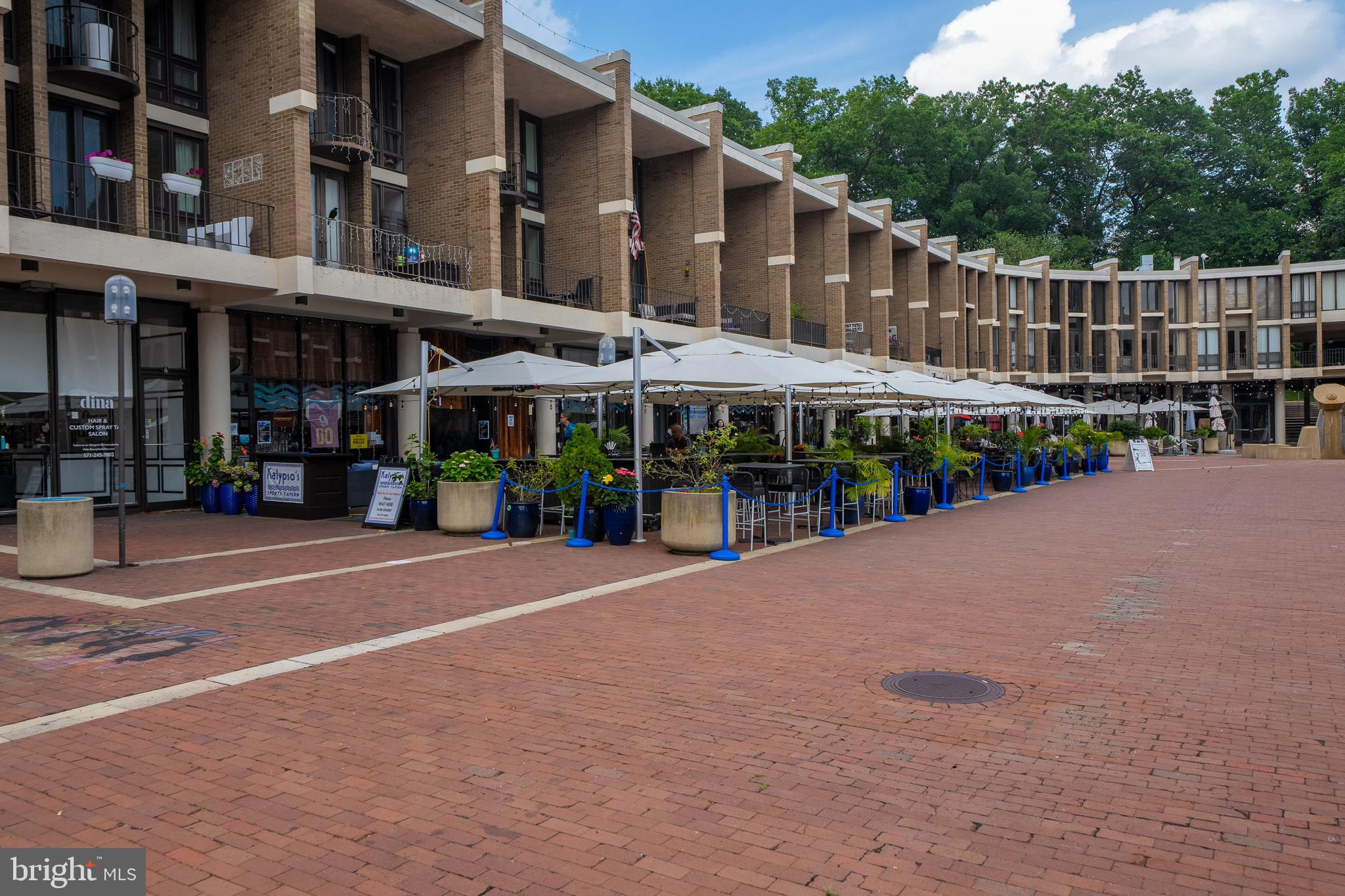1674 Chimney House Road Reston, VA 20190 - Photo 37 of 39 a front view of a building with street