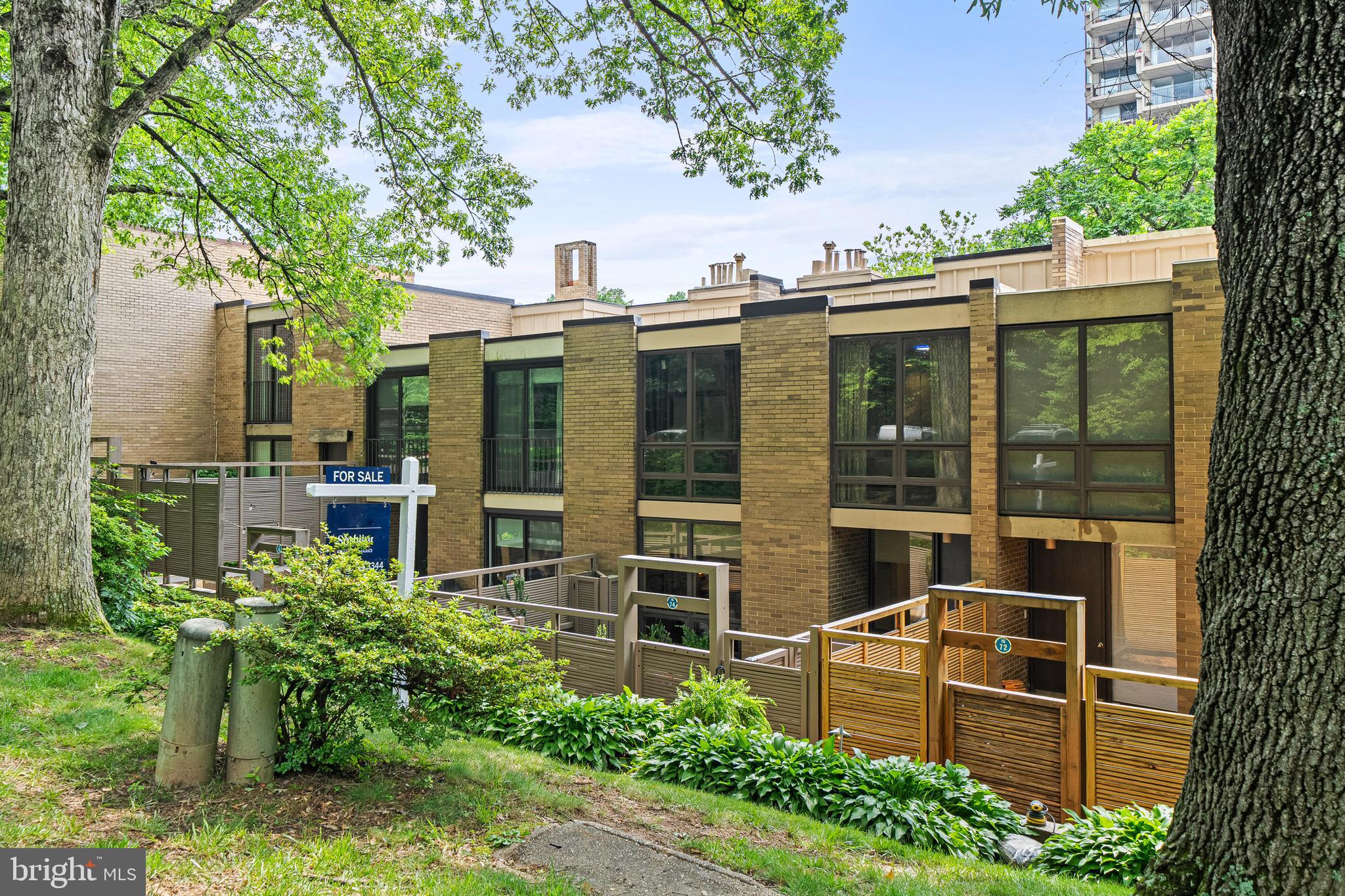 1674 Chimney House Road Reston, VA 20190 - Photo 4 of 39 front view of a house with a garden
