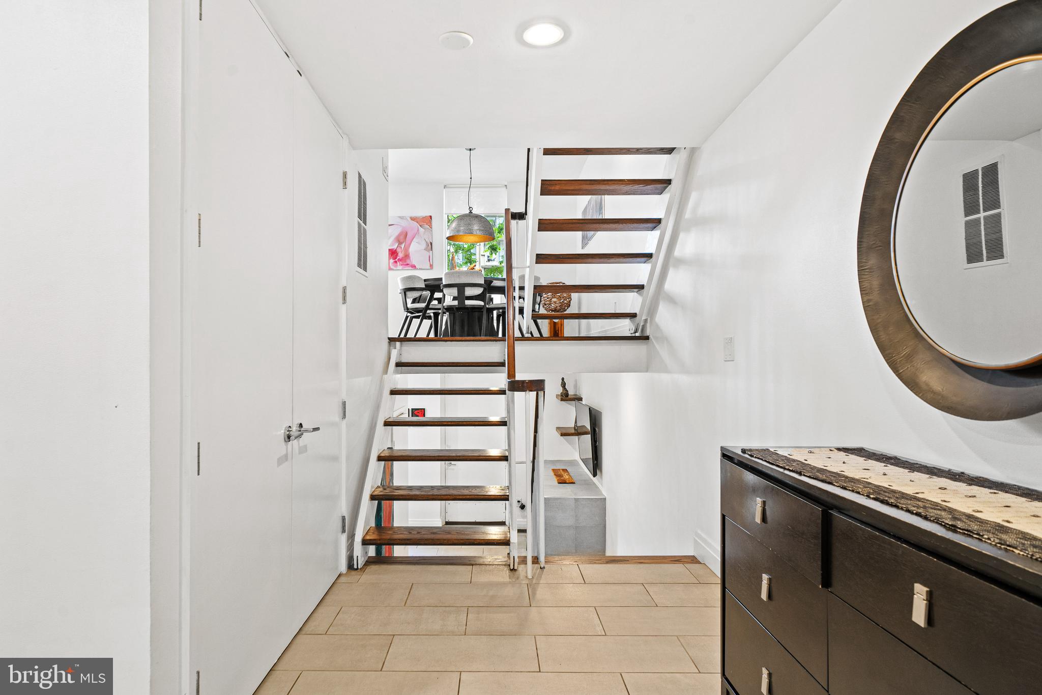 1674 Chimney House Road Reston, VA 20190 - Photo 7 of 39 a kitchen with granite countertop a stove and a sink