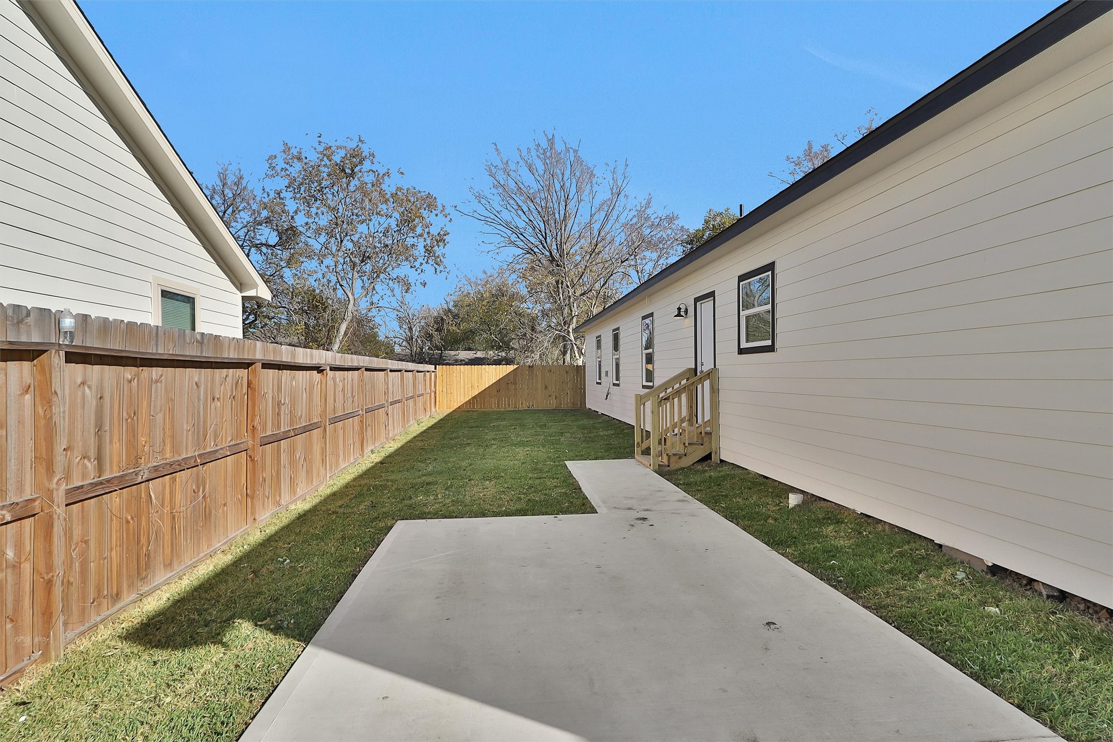 3916 Falls Street Houston, TX 77026 - Photo 14 of 28 a view of a house with a yard