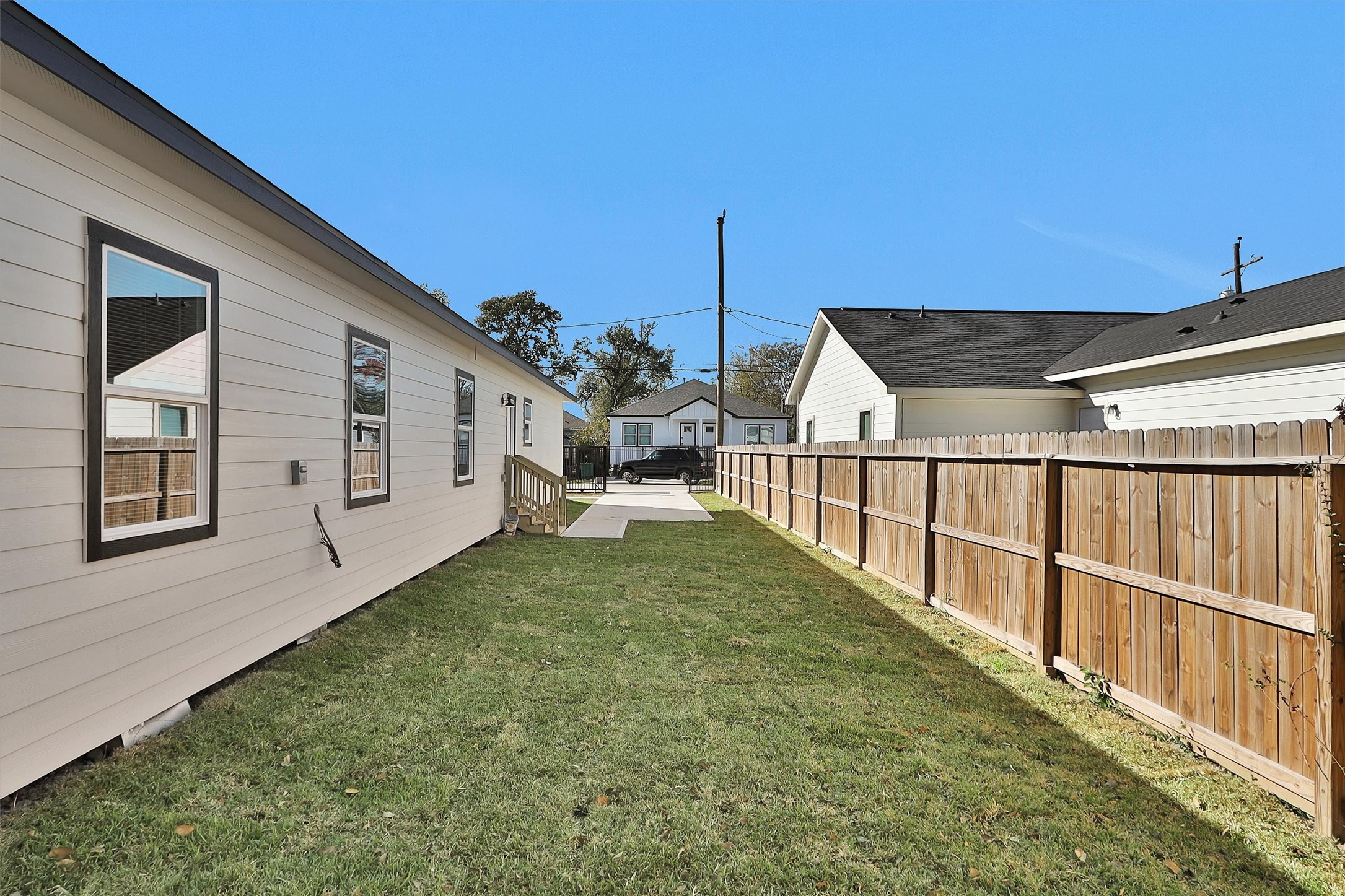 3916 Falls Street Houston, TX 77026 - Photo 15 of 28 a view of a house with wooden fence