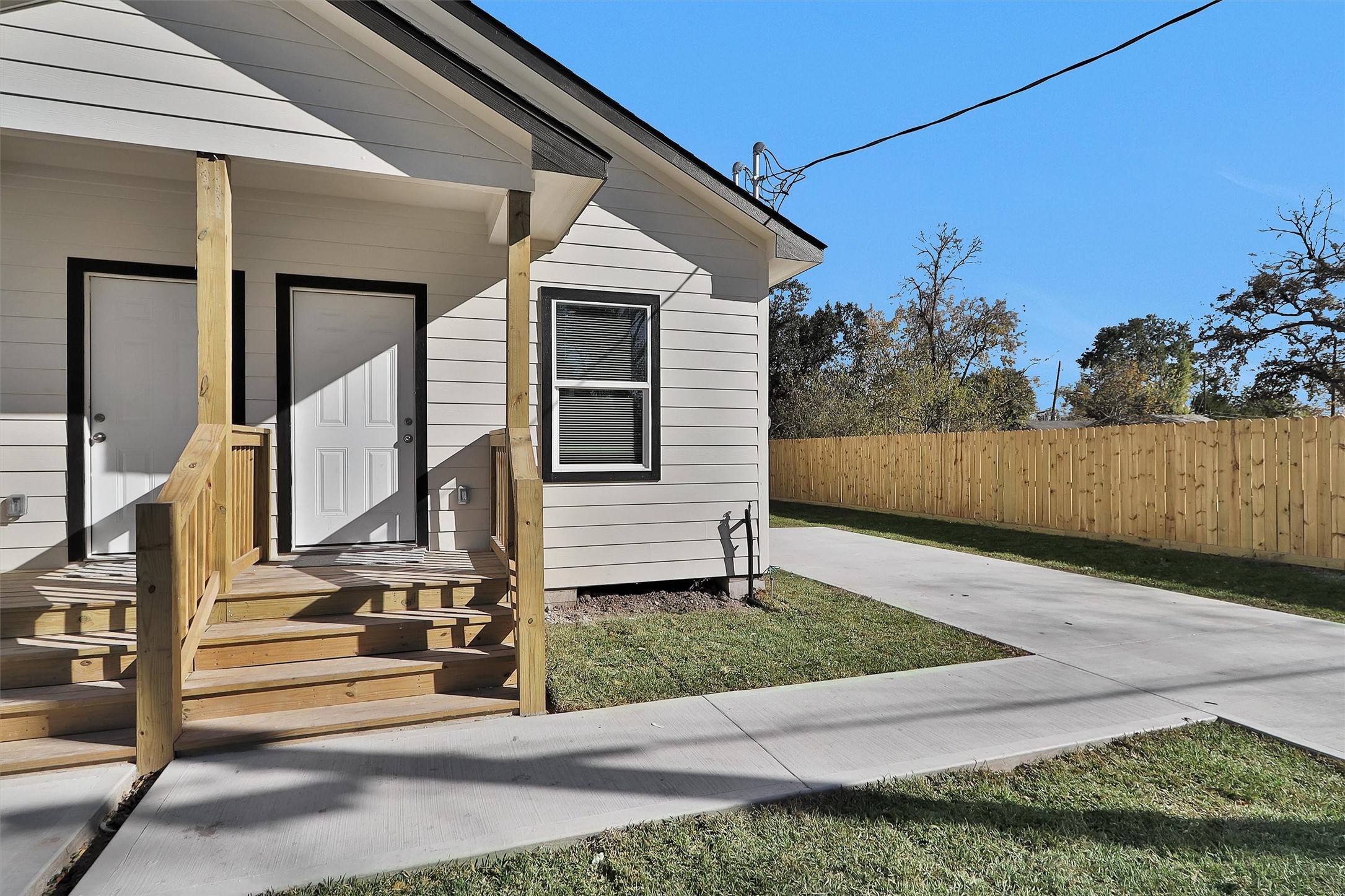 3916 Falls Street Houston, TX 77026 - Photo 16 of 28 a view of a house with a yard