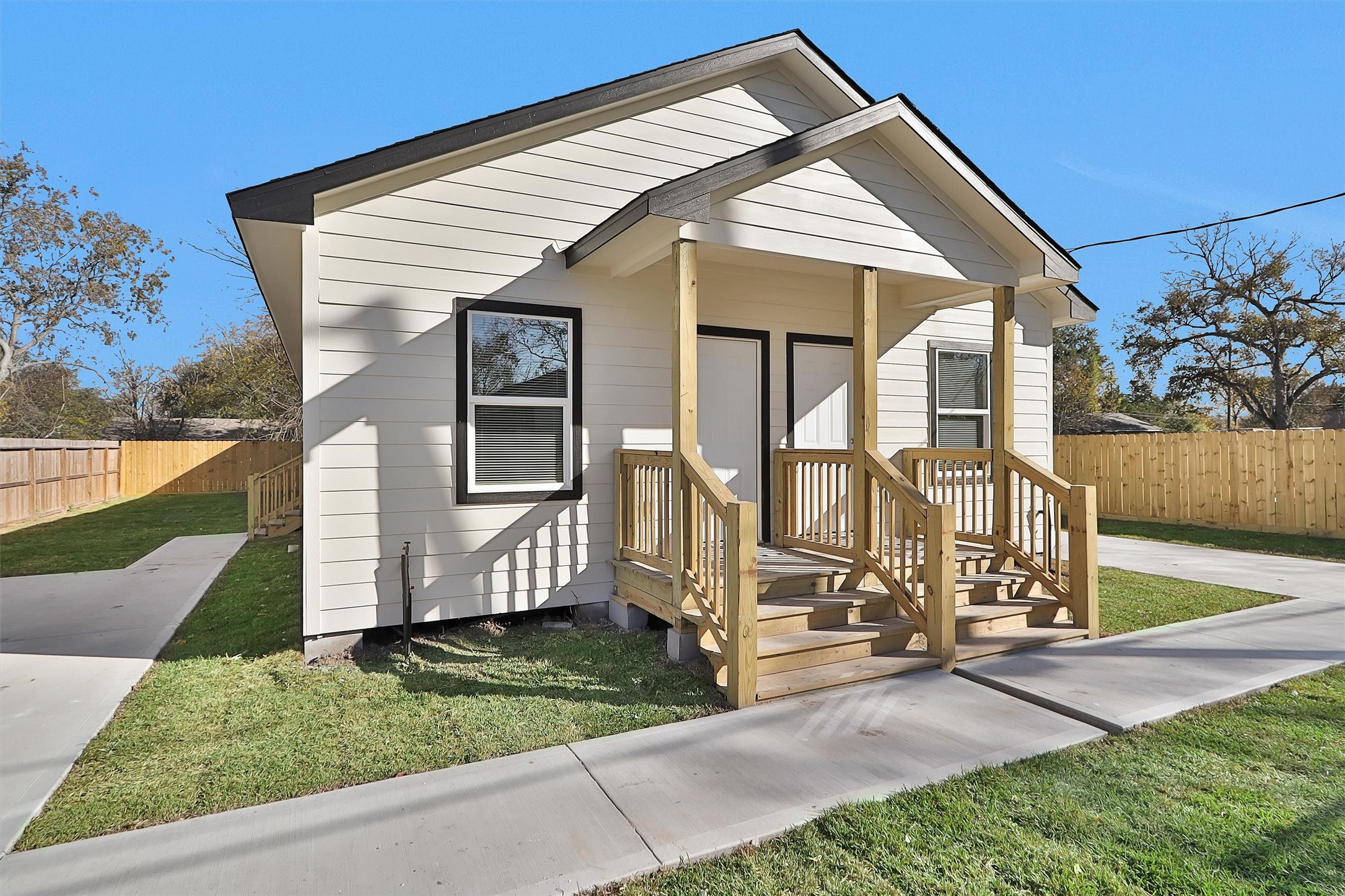 3916 Falls Street Houston, TX 77026 - Photo 2 of 28 a view of a house with a yard