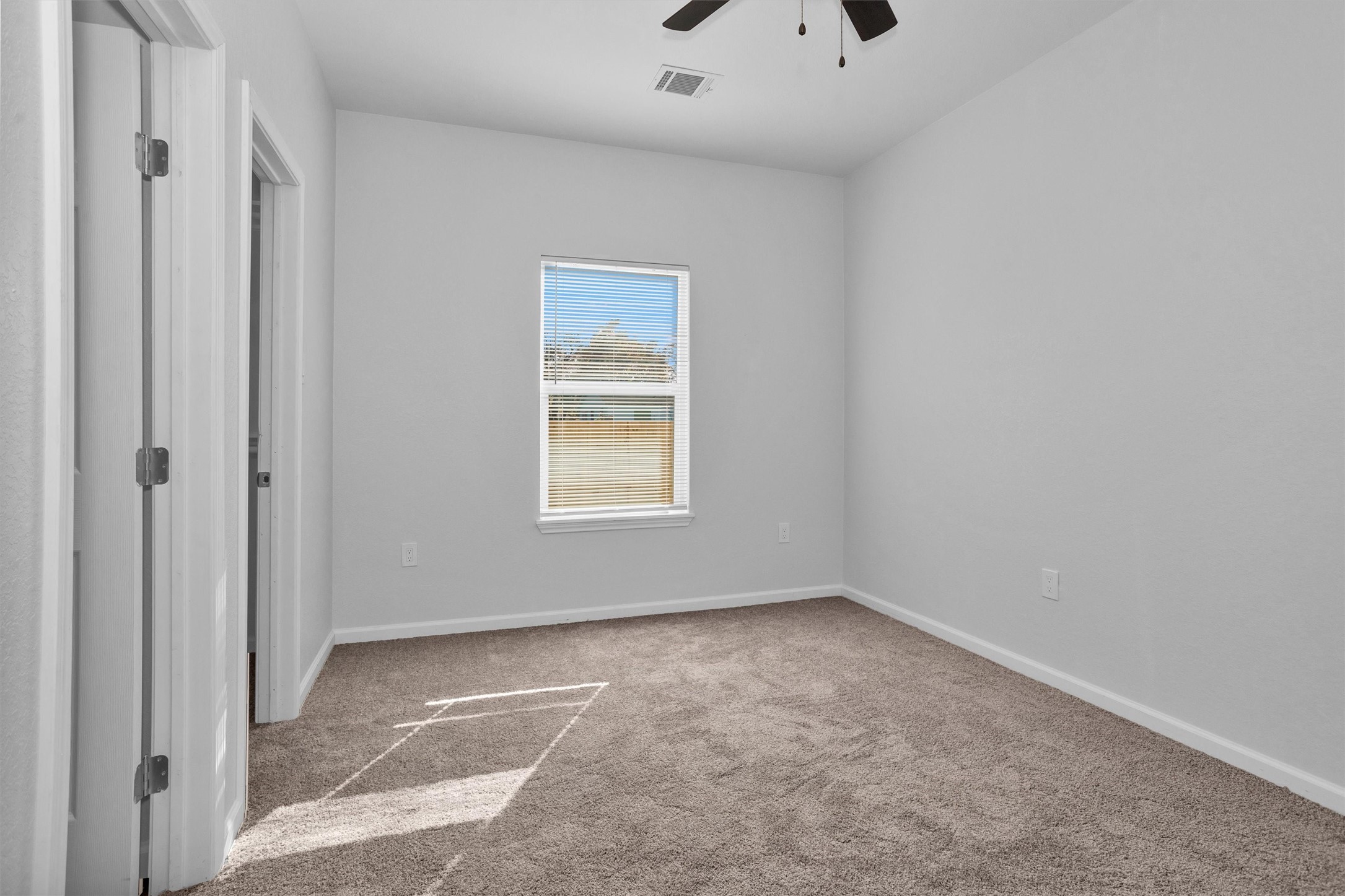 3916 Falls Street Houston, TX 77026 - Photo 22 of 28 a view of an empty room with a window