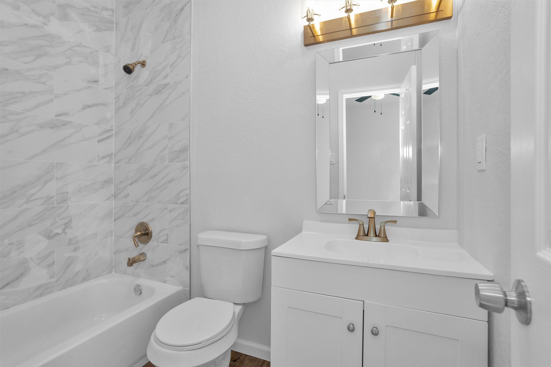 3916 Falls Street Houston, TX 77026 - Photo 23 of 28 a bathroom with a sink toilet and shower