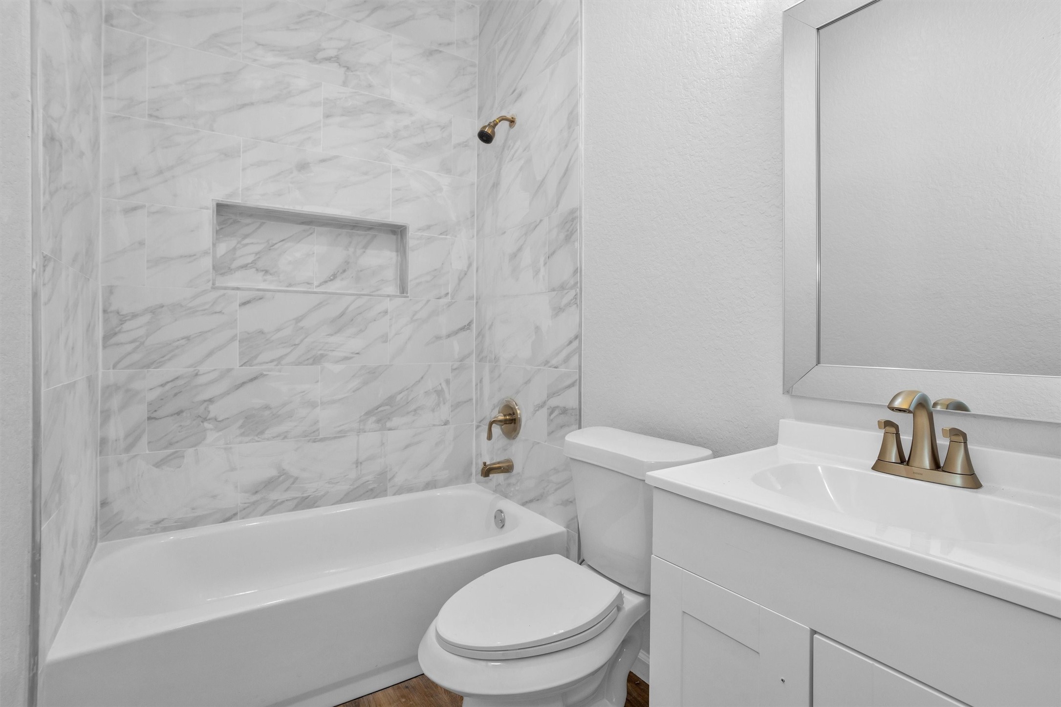 3916 Falls Street Houston, TX 77026 - Photo 25 of 28 a bathroom with a sink toilet and bathtub