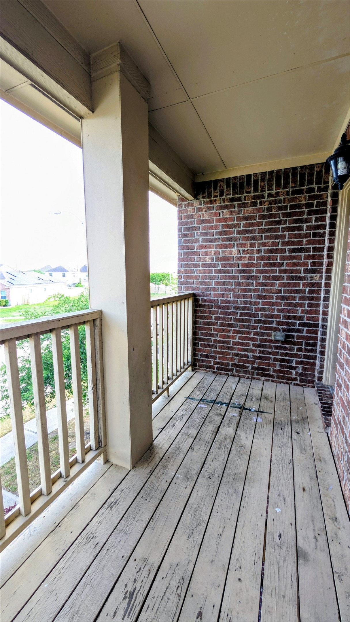 7326 Granite Terrace Lane Houston, TX 77083 - Photo 30 of 39 a view of balcony with wooden floor
