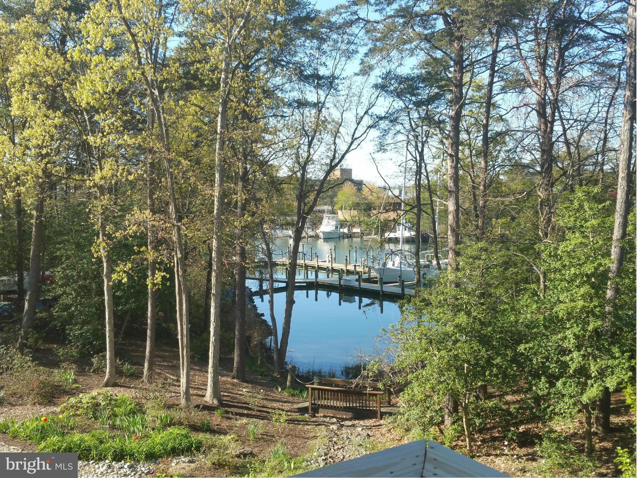 524 Runabout Loop, Unit 9 Solomons, MD 20688 - Photo 2 of 25 a view of a lake from a house