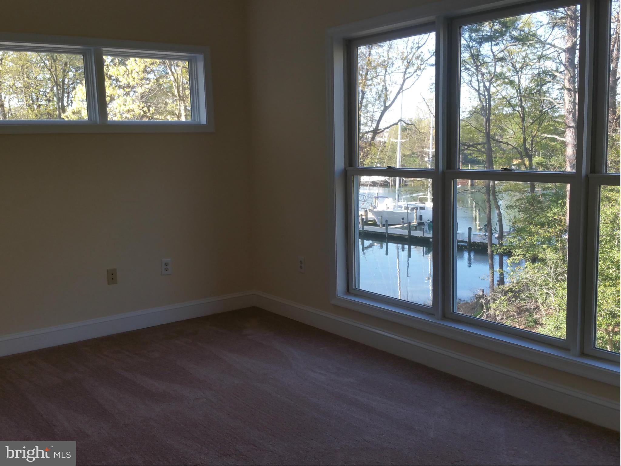 524 Runabout Loop, Unit 9 Solomons, MD 20688 - Photo 19 of 25 a view of an empty room and window