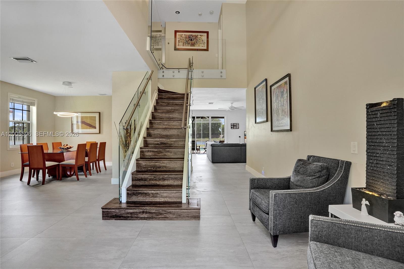 4281 Laurel Ridge Circle Weston, FL 33331 - Photo 14 of 80 a living room with furniture and wooden floor