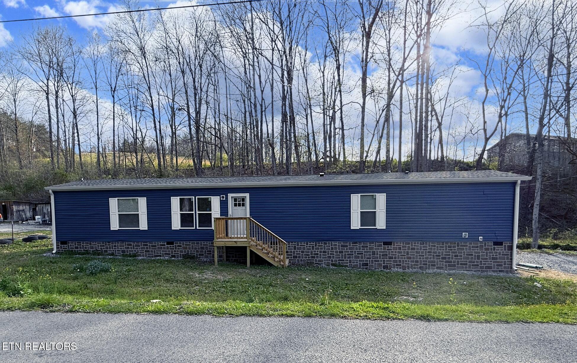 596 Old Long Hollow Road La Follette, TN 37766 - Photo 1 of 37 IMG_3610