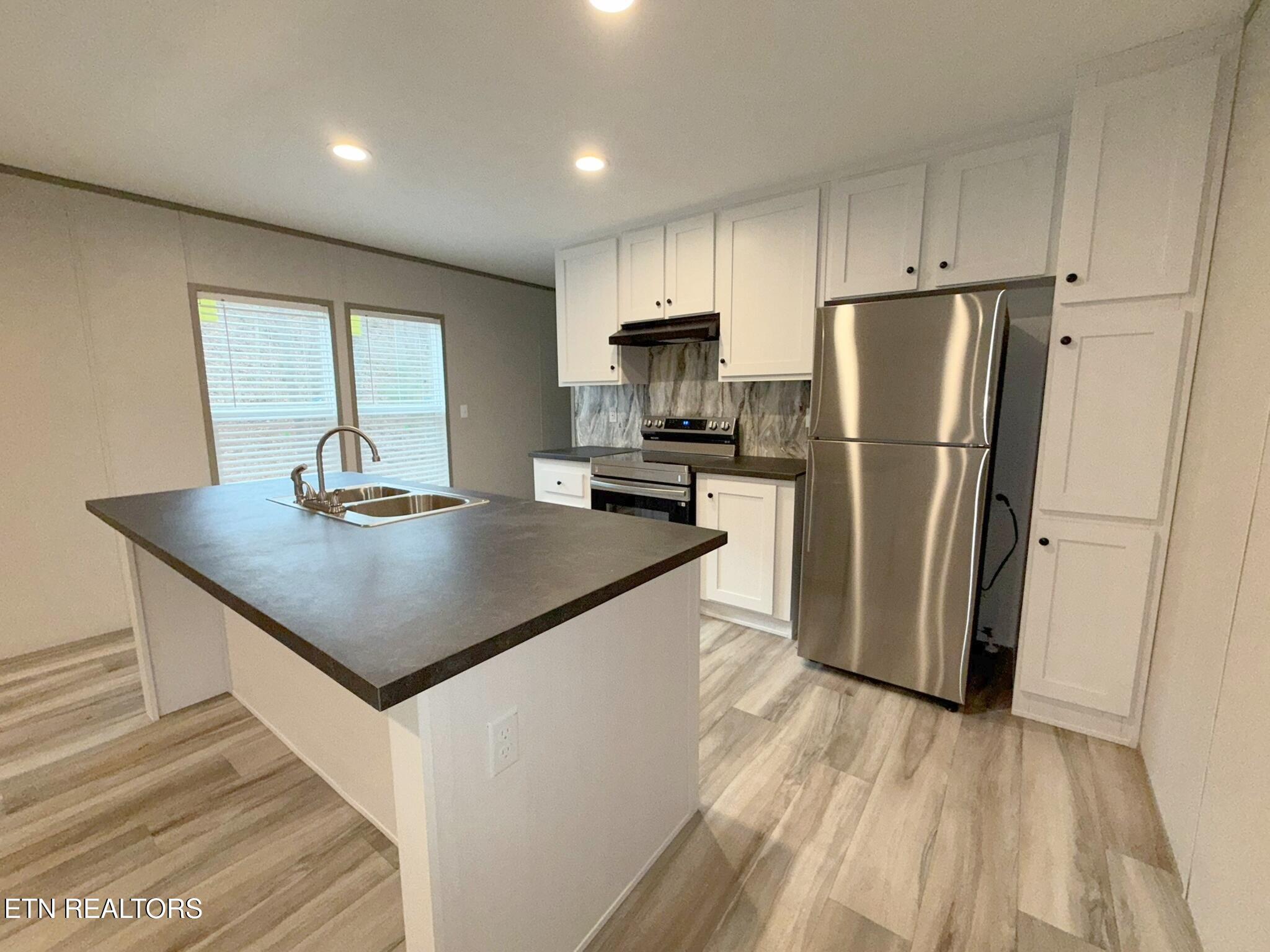 596 Old Long Hollow Road La Follette, TN 37766 - Photo 6 of 34 IMG_2211