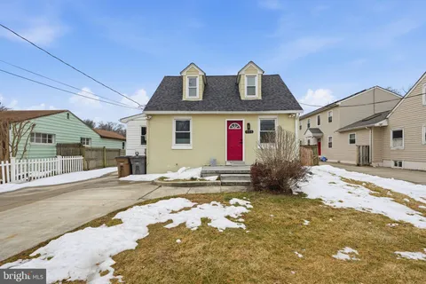 a front view of house with yard