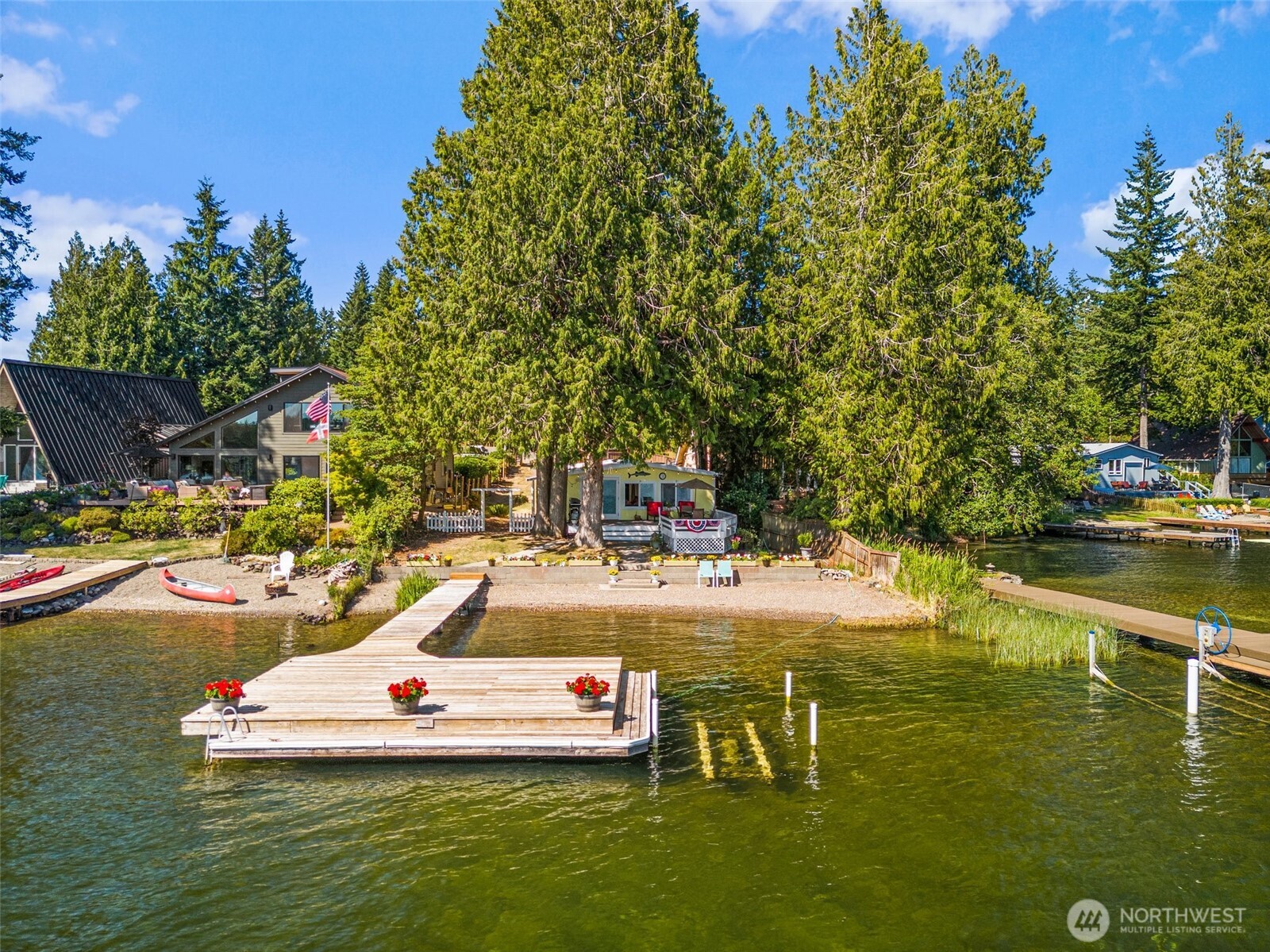 21 Shore Court Grapeview, WA 98546 - Photo 11 of 34 a view of a swimming pool with chairs