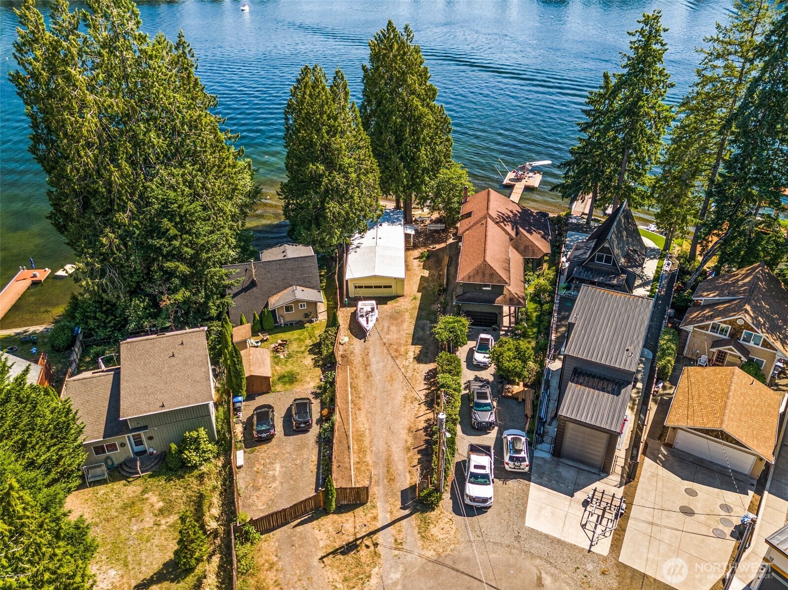 21 Shore Court Grapeview, WA 98546 - Photo 30 of 34 an aerial view of residential house with outdoor space and trees all around