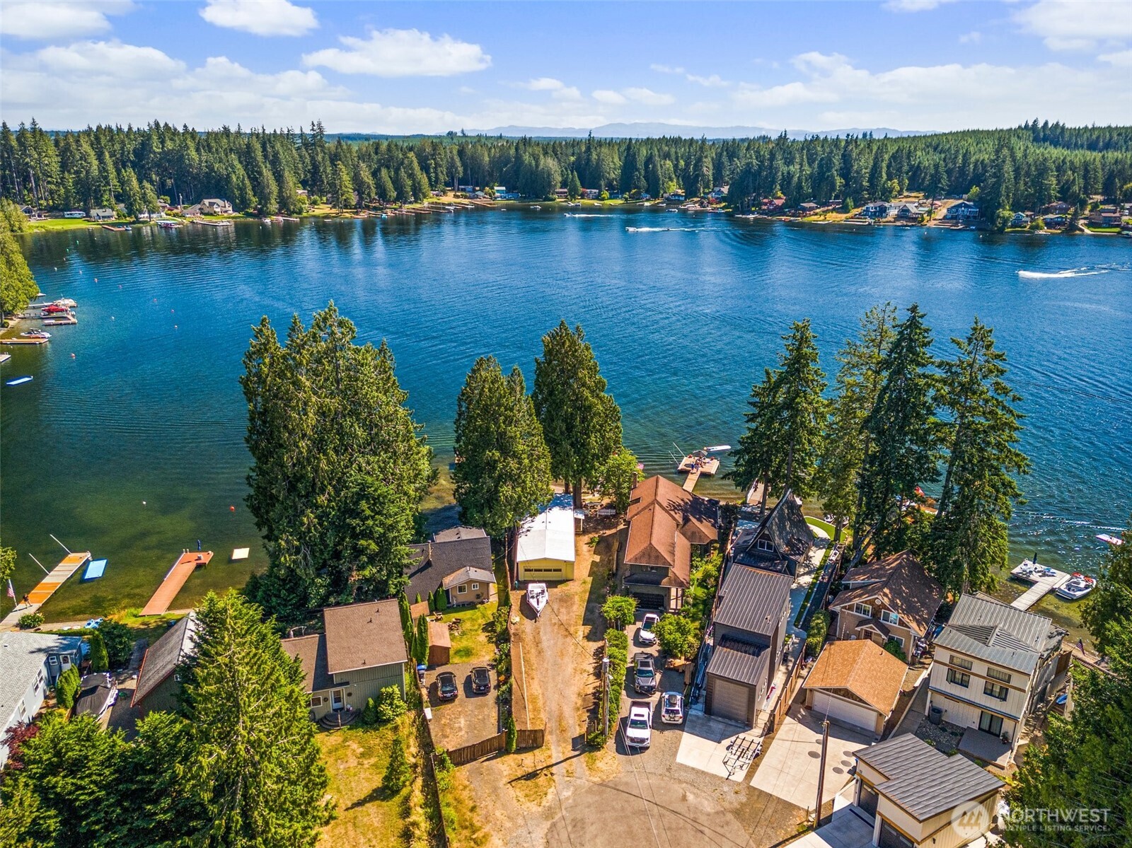 21 Shore Court Grapeview, WA 98546 - Photo 5 of 34 an aerial view of residential houses with outdoor space and lake view
