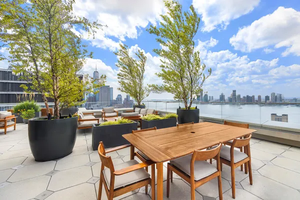 a view of backyard with seating space