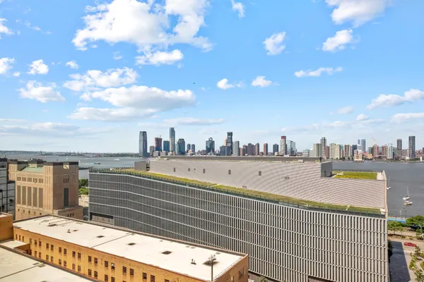 a bathroom with a granite countertop toilet a sink and bathtub