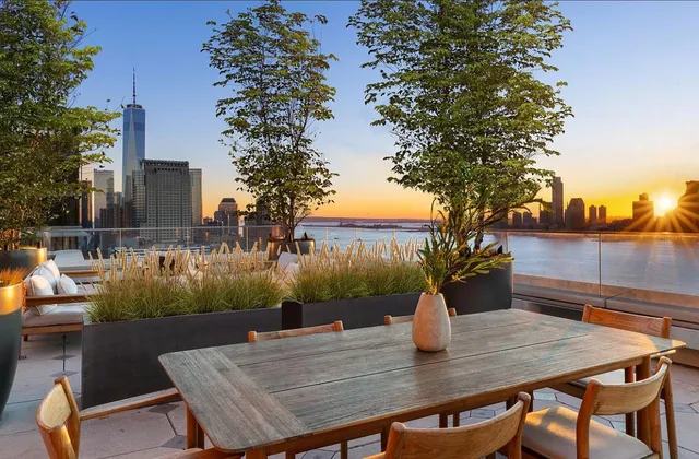 a view of swimming pool with outdoor seating