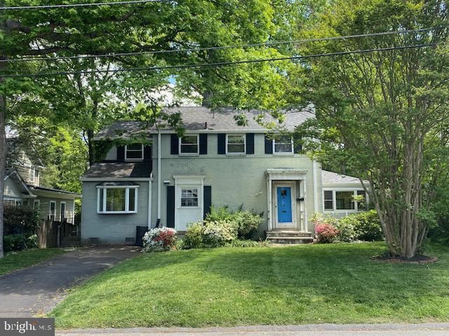 Charming home with vibrant curb appeal.