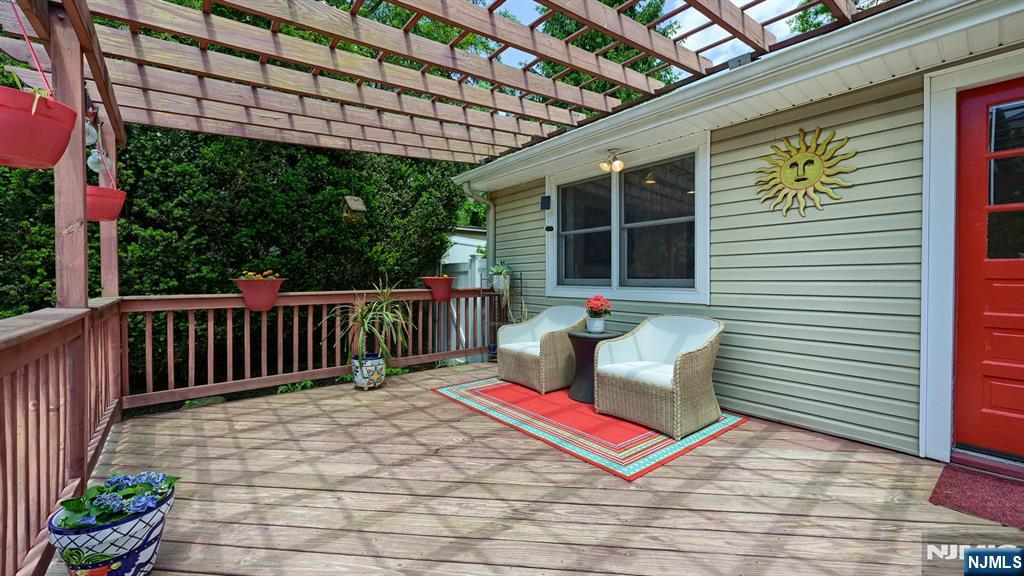 277 French Hill Road Wayne, NJ 07470 - Photo 25 of 28 a building outdoor space with patio furniture and potted plants