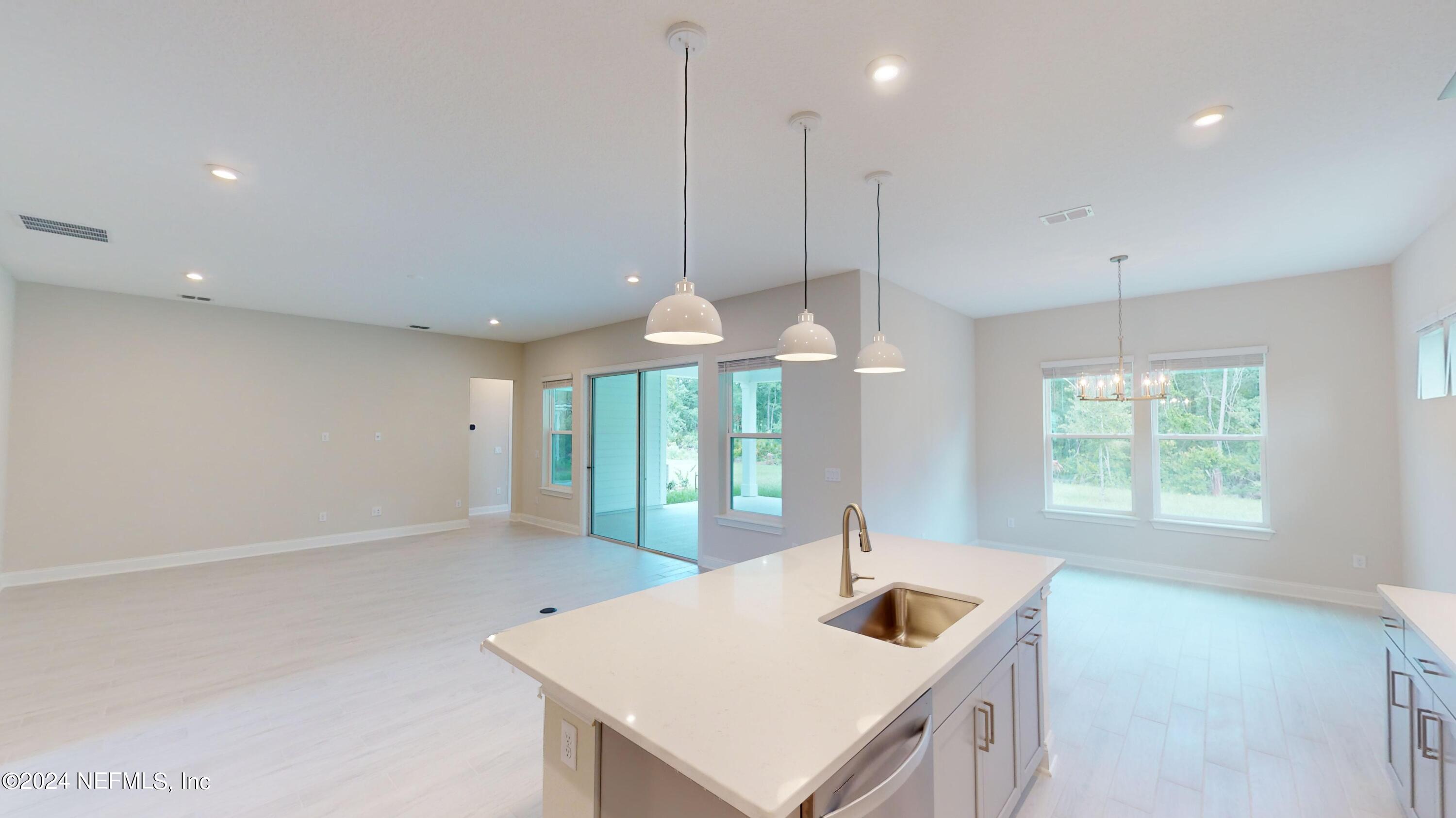 79 Ridgehill Way St. Johns, FL 32259 - Photo 8 of 85 79-Ridgehill-Way-Kitchen-to-Family-and-D