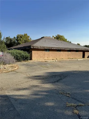 a view of a swimming pool and an outdoor space