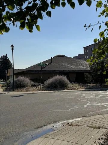 a view of a house with a street