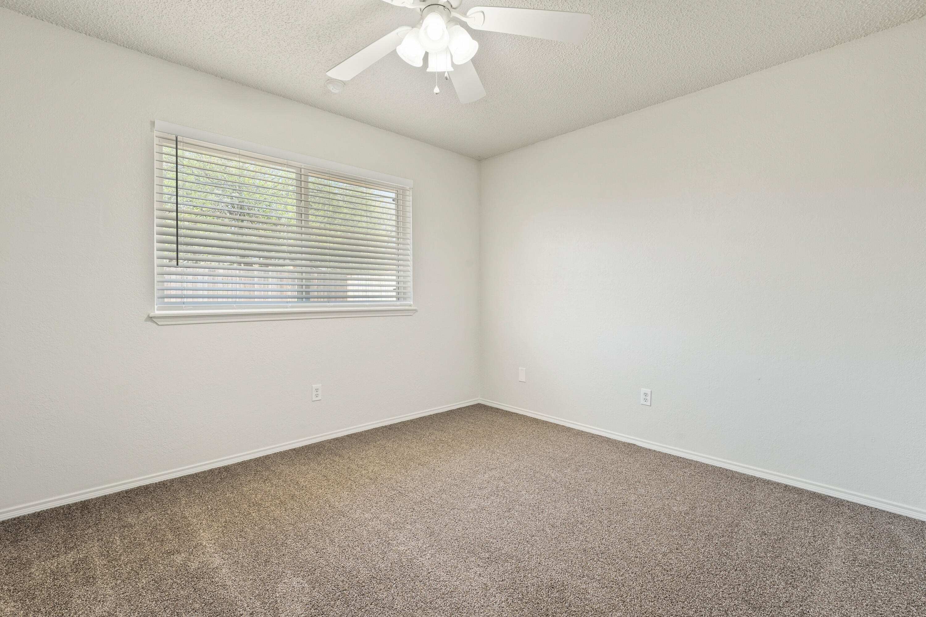 7004 Wayne Avenue Lubbock, TX 79424 - Photo 24 of 29 an empty room with a window