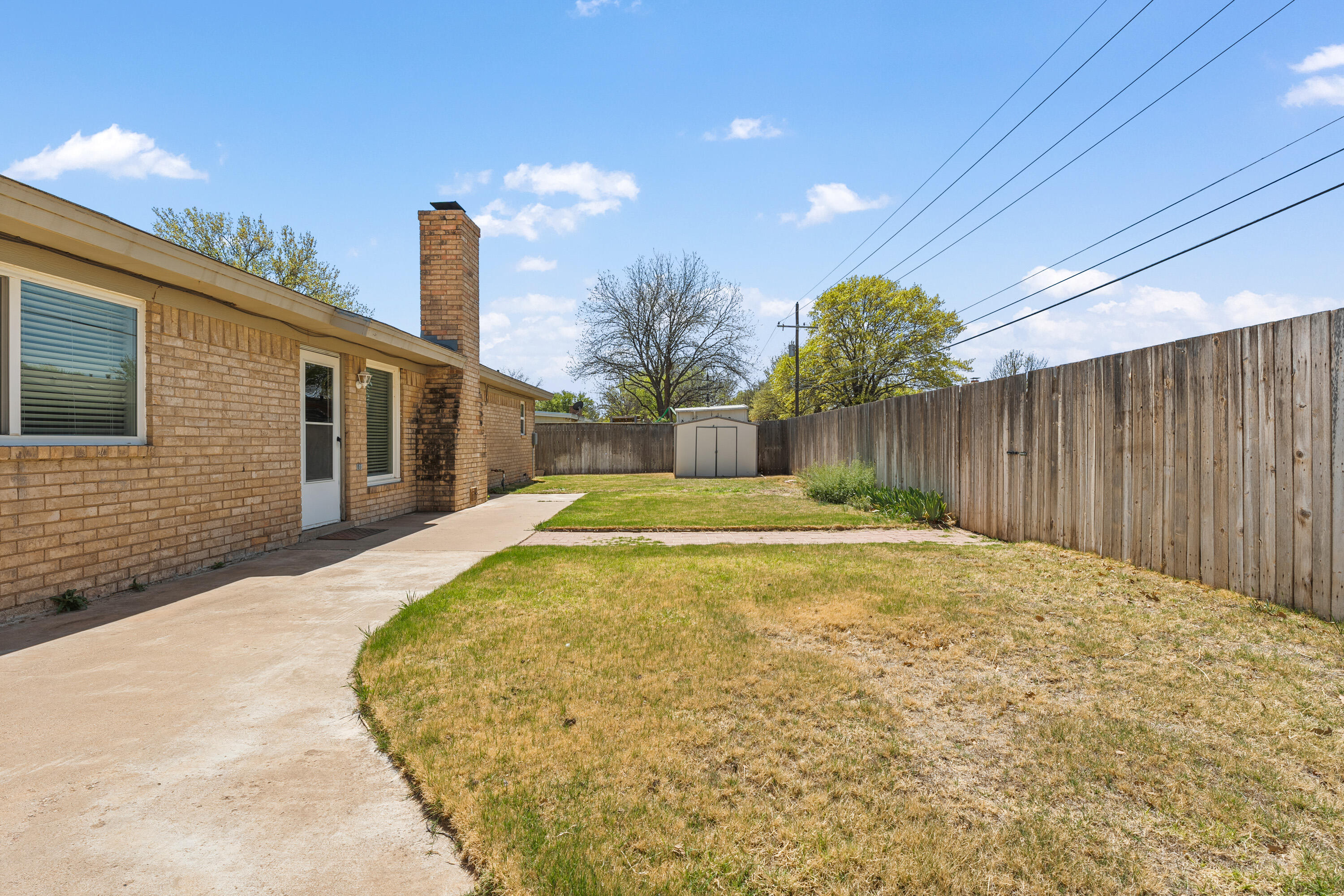 7004 Wayne Avenue Lubbock, TX 79424 - Photo 27 of 29 a house with swimming pool in front of it