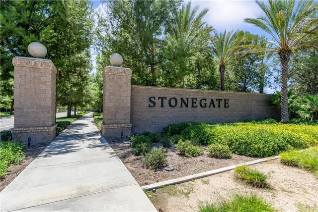a view of outdoor space with garden and trees